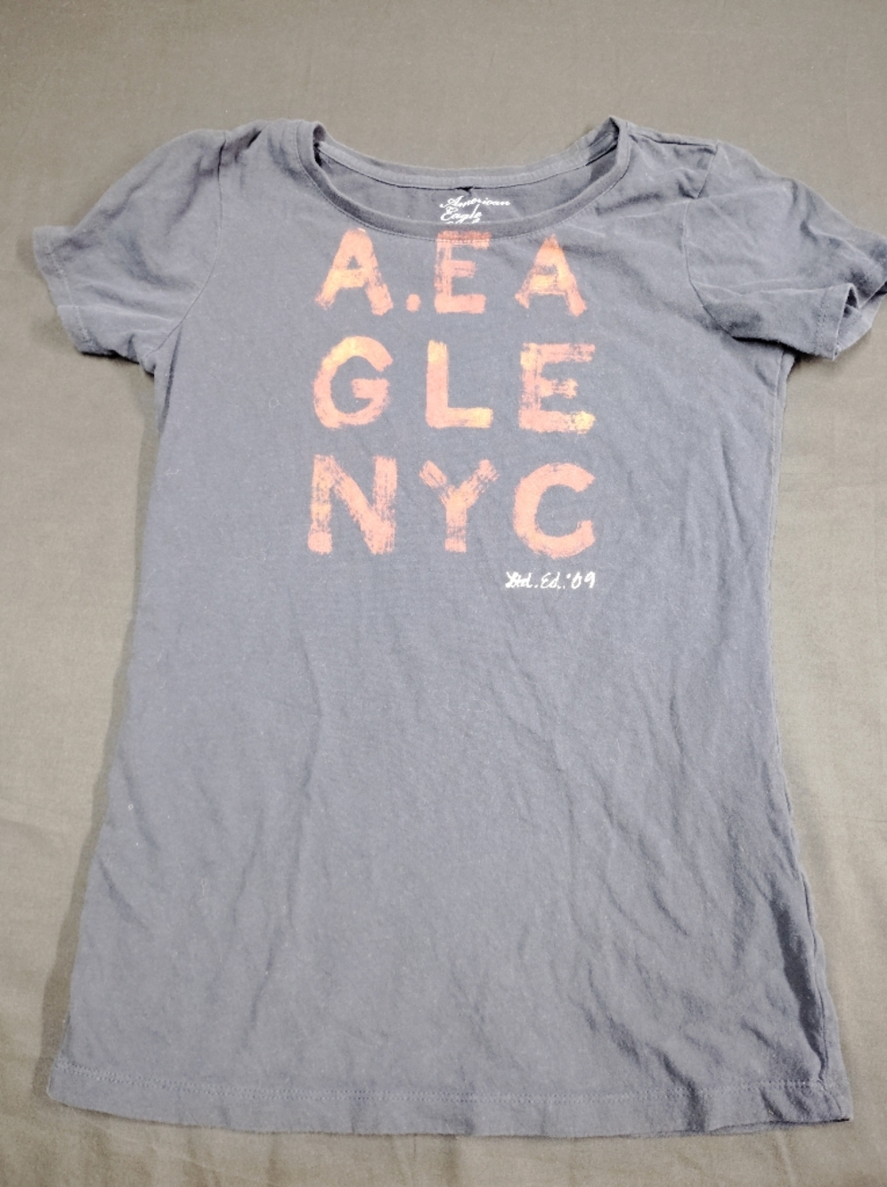 American Eagle Outfitters Faded Black Navy Tee with Orange Graphic